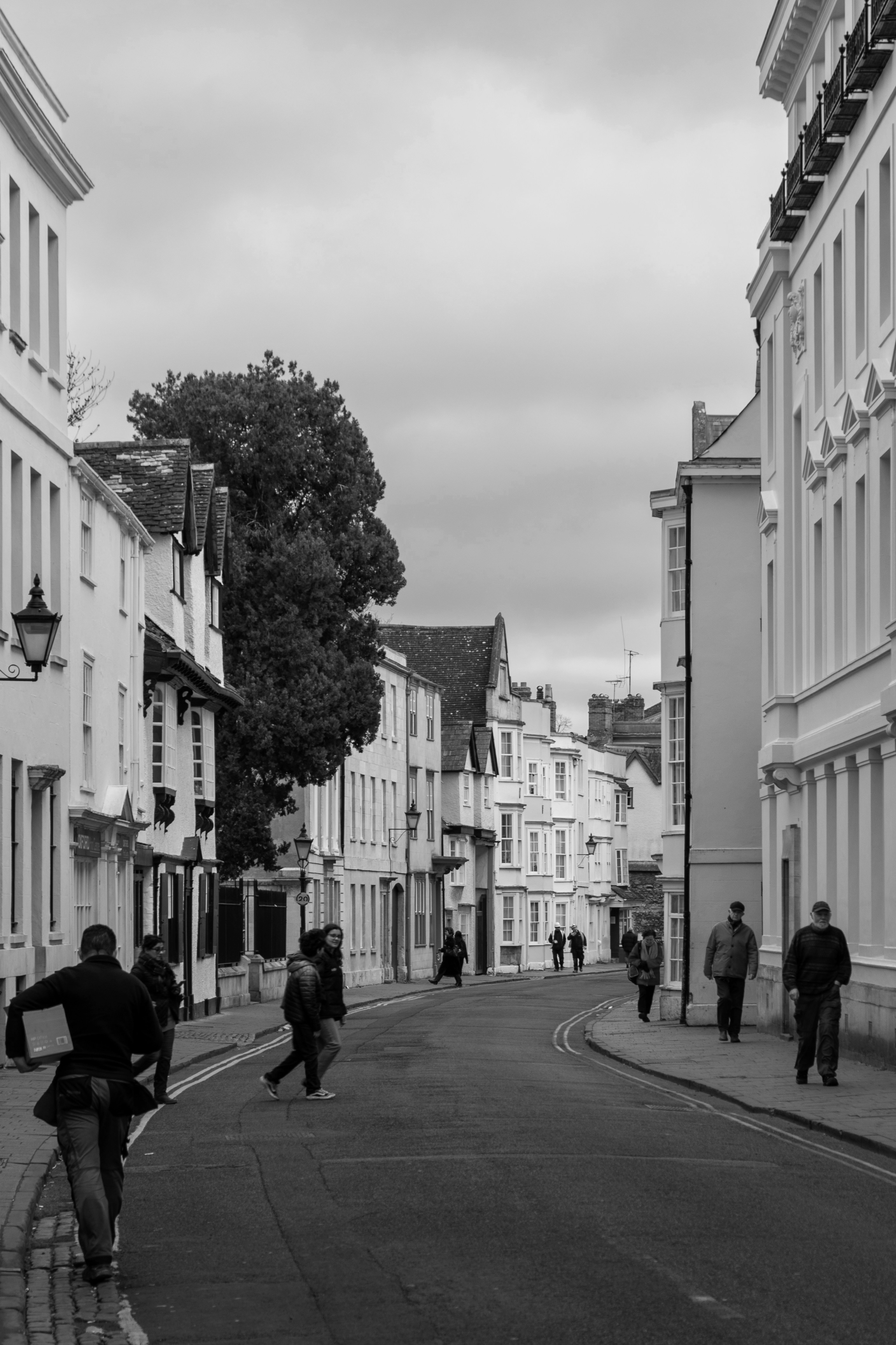 Historic High Street, Kings Langley, with period buildings and lamp posts